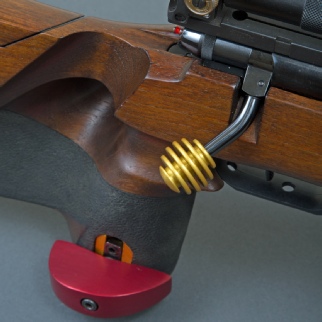 Gold anodised CNC machined skeleton bolt knob and red anodised palm shelf fitted to Anschutz 1813 match rifle